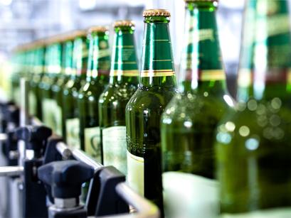 bottles of beer on a conveyer belt