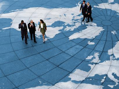 People walking on world map