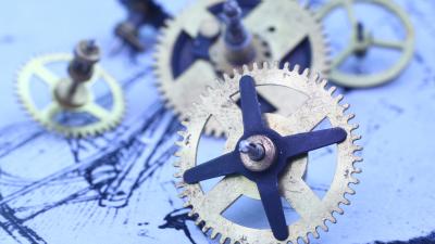 Gears sitting on blueprints