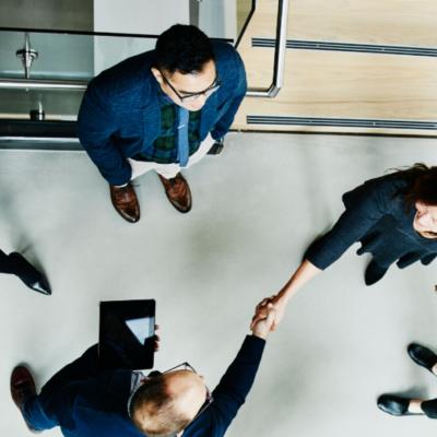 Aerial view of business people shaking hands