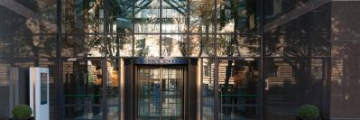 glass windows of a building with reflections