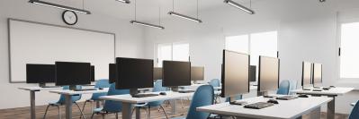 classroom with desks and computers
