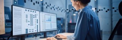 Woman working at computer in office